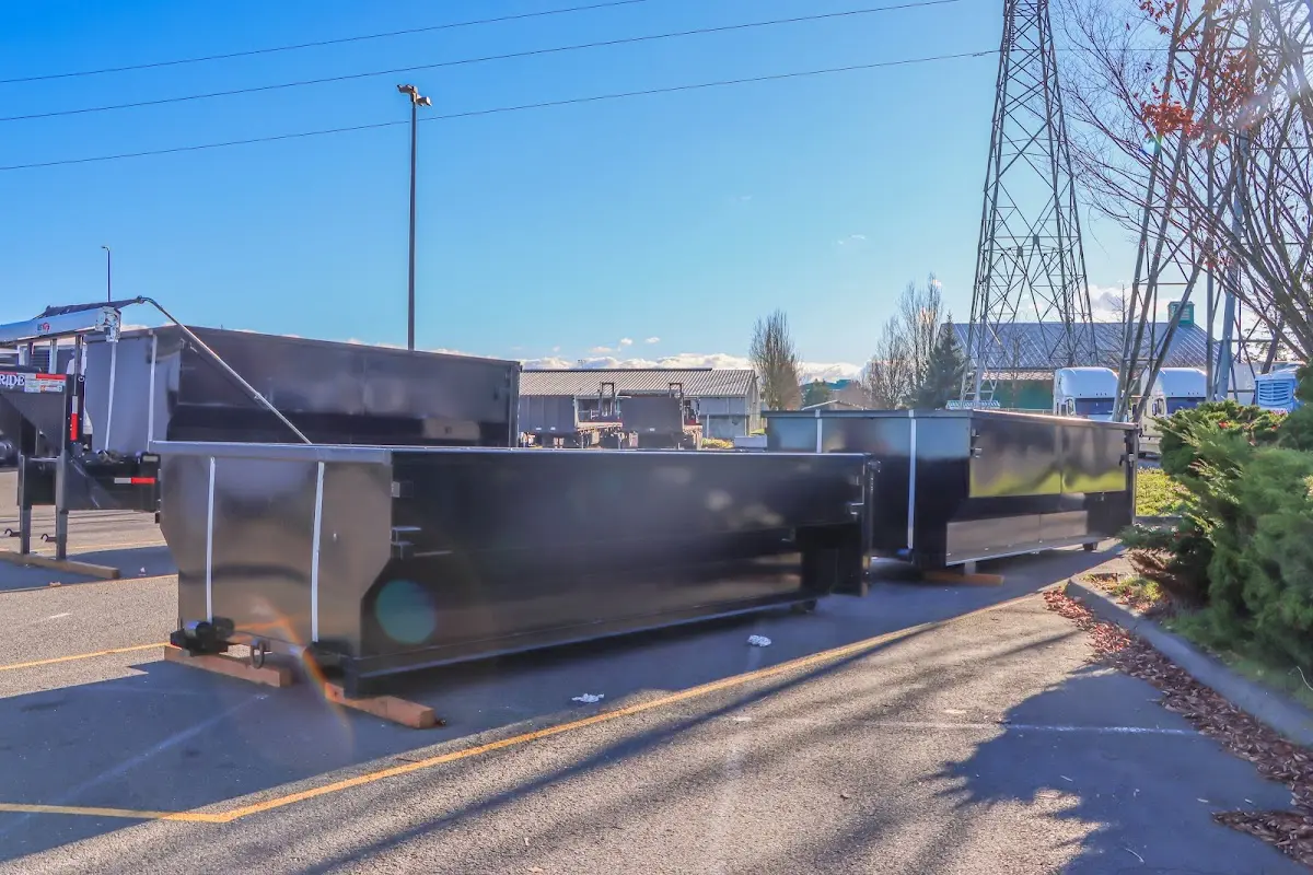 Roll-off dumpster ready for waste disposal at job site for 20 Yard Dumpster Rental in Chalmette